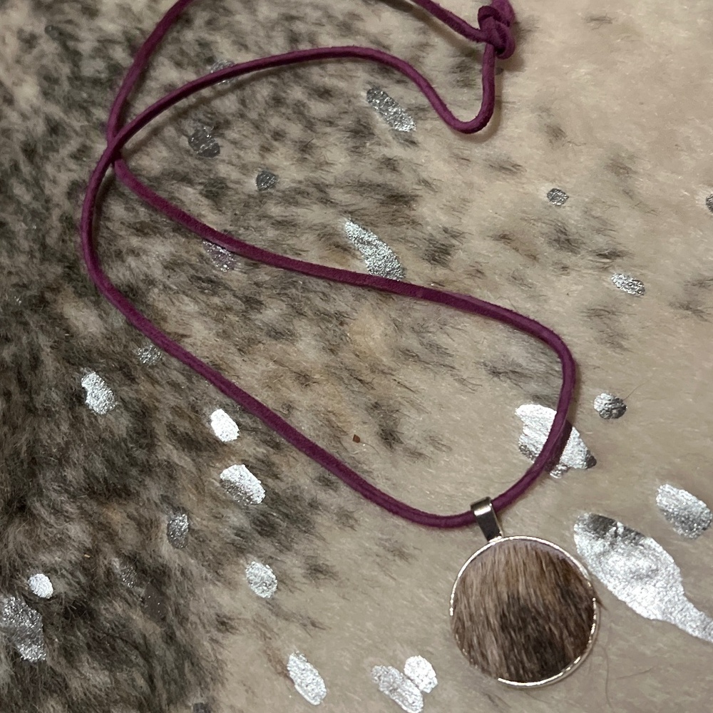 Handmade necklace -leather strap and cowhide pendant.